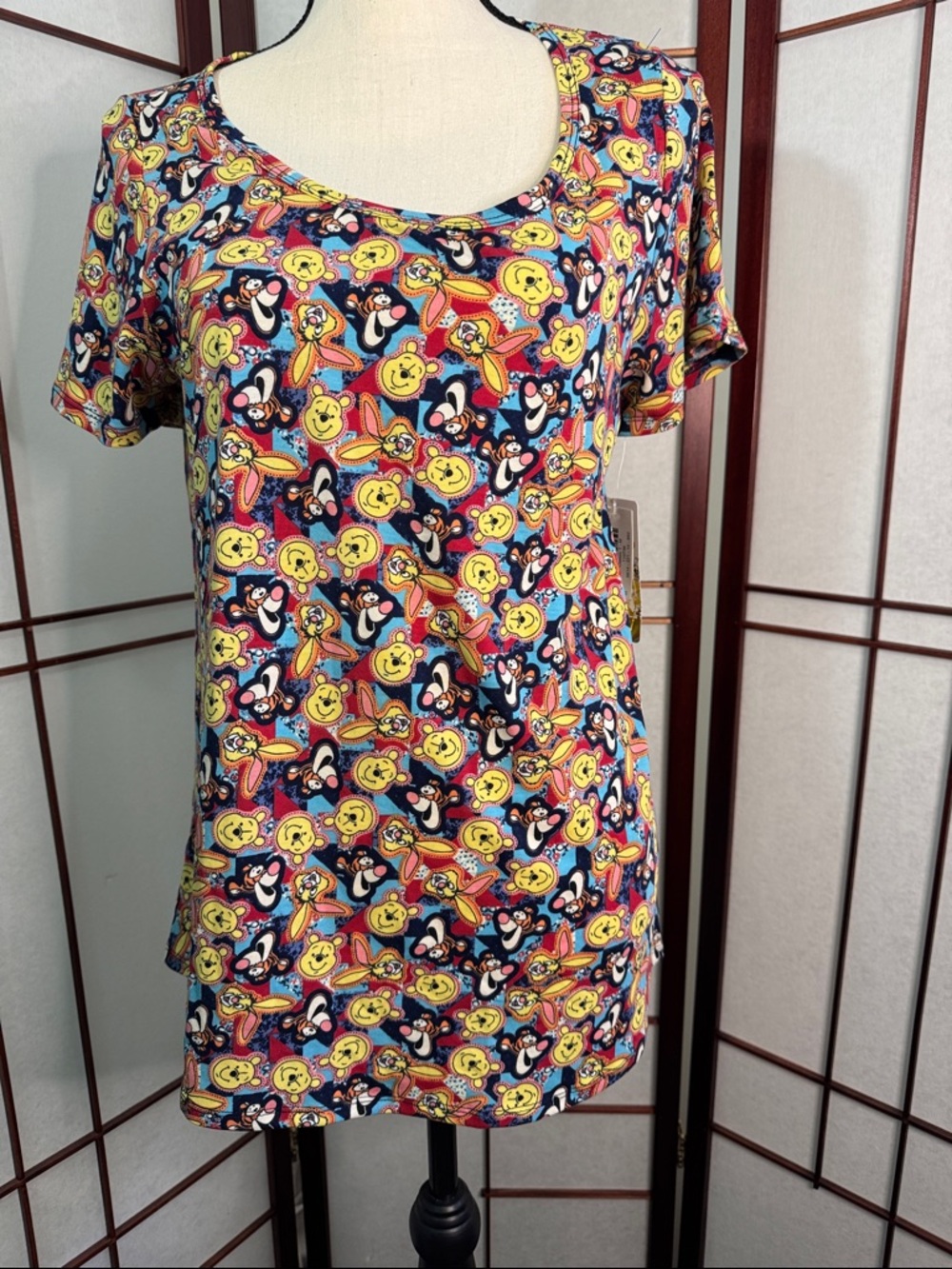LuLaRoe Short Sleeve Tee  featuring Disney’s Pooh and friends